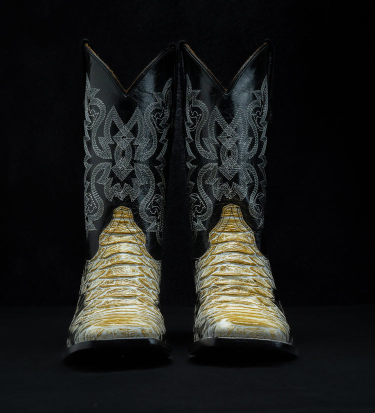 Western boot in Natural Python Monster style, square toe, leather sole and heel.