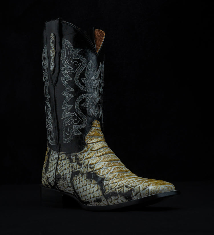 Western boot in Natural Python Monster style, square toe, leather sole and heel.