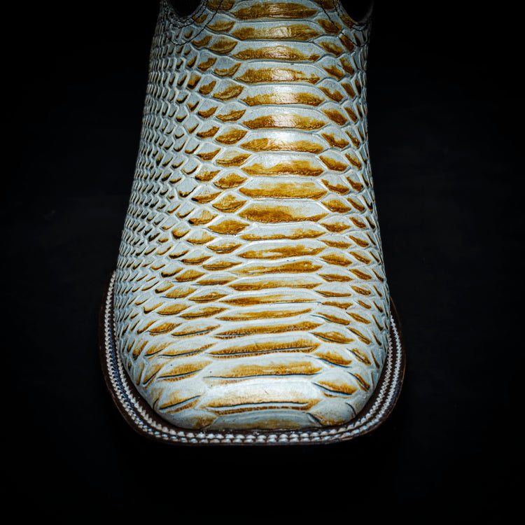 <tc>Bota vaquera Pitón color maple, cuadrada, suela y tacon de cuero</tc>