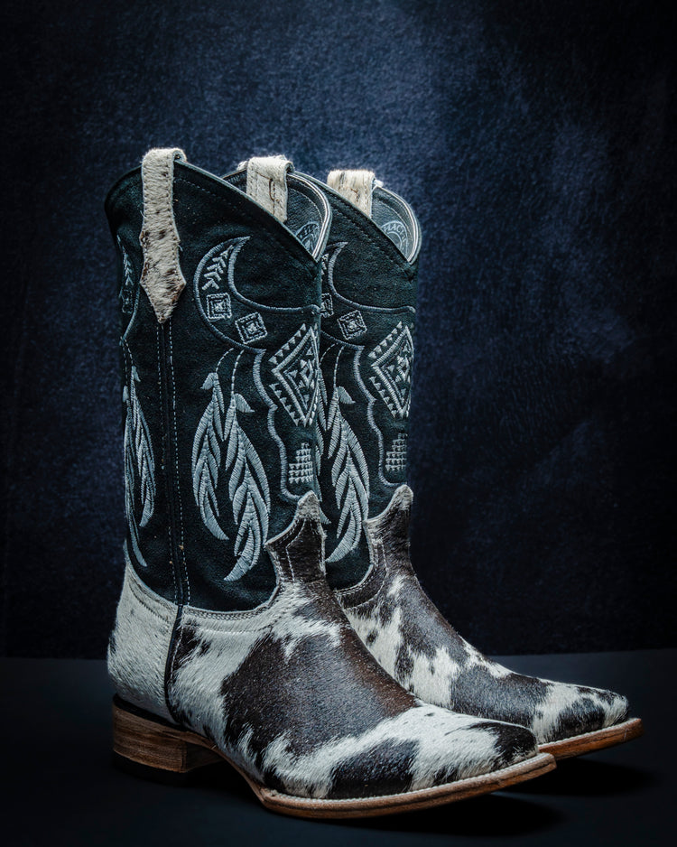 Original leather boot for women made from black and white hair-on-hide, short shaft.