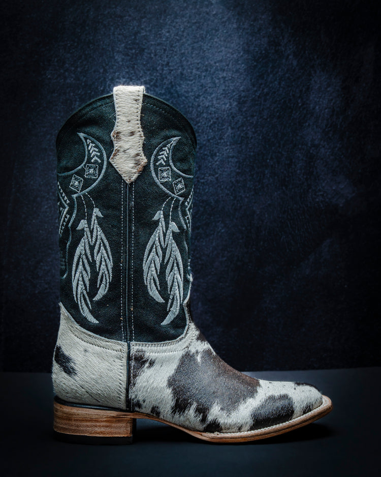 Original leather boot for women made from black and white hair-on-hide, short shaft.