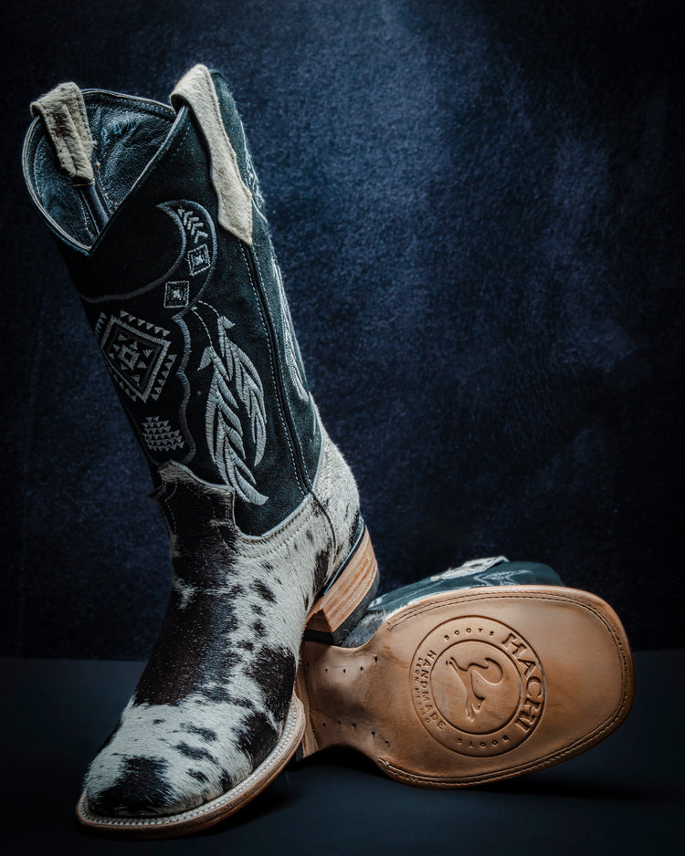 Original leather boot for women made from black and white hair-on-hide, short shaft.