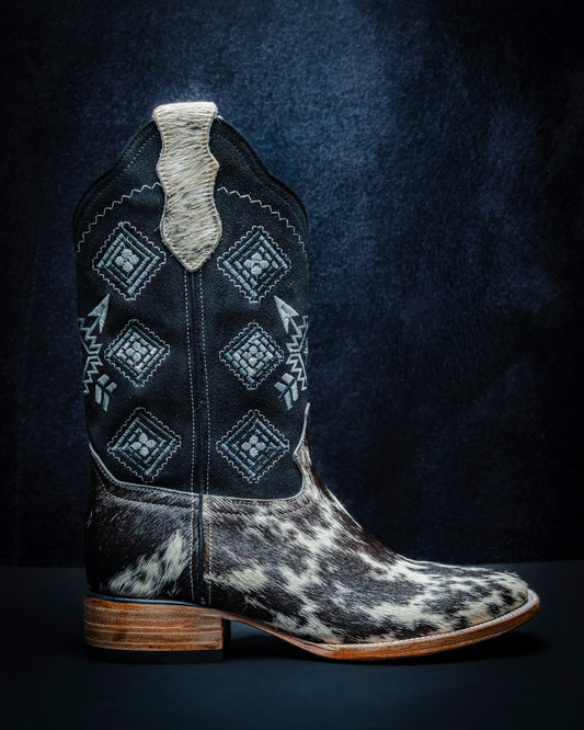 Original leather boot for men made from black and white hair-on-hide.
