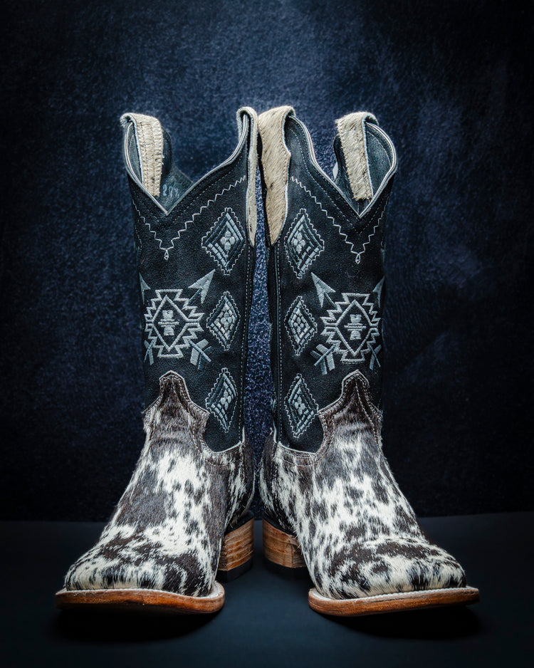 Original leather boot for men made from black and white hair-on-hide.