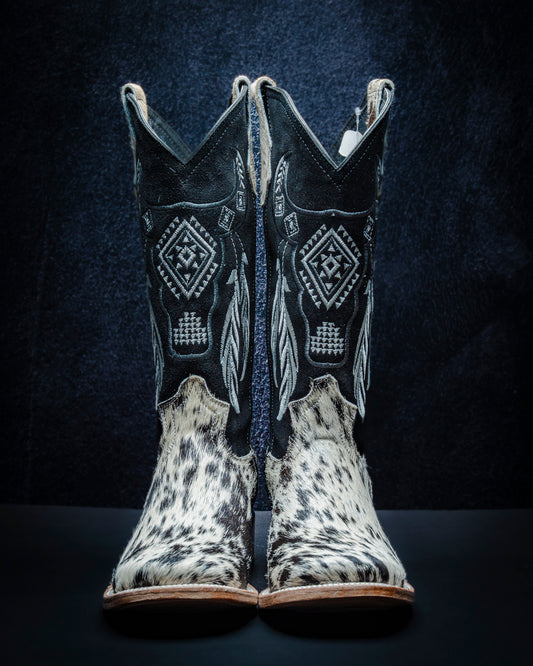 Original leather boot for women with black and white hair-on-hide and tall shaft.