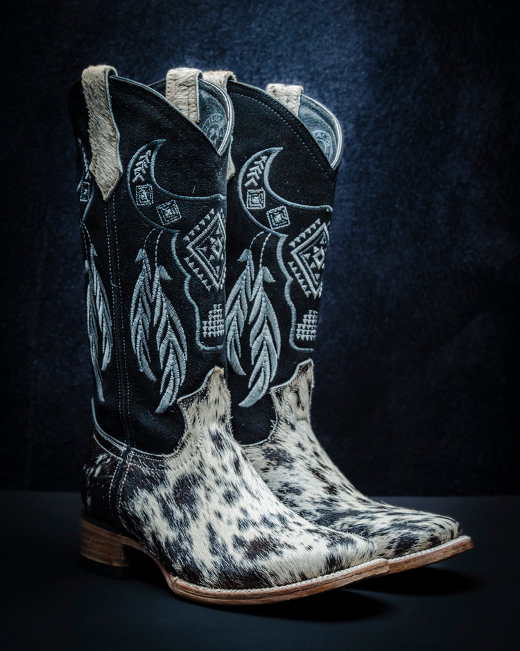 Original leather boot for women with black and white hair-on-hide and tall shaft.