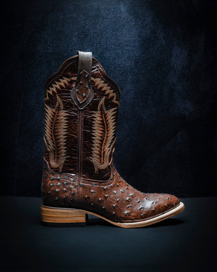 Ostrich-style plastisol leather boot for men, brown color.