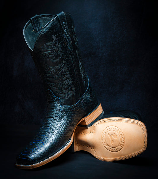 Western boot in Black-Blue Bicolor Python style, square toe, leather sole and heel.