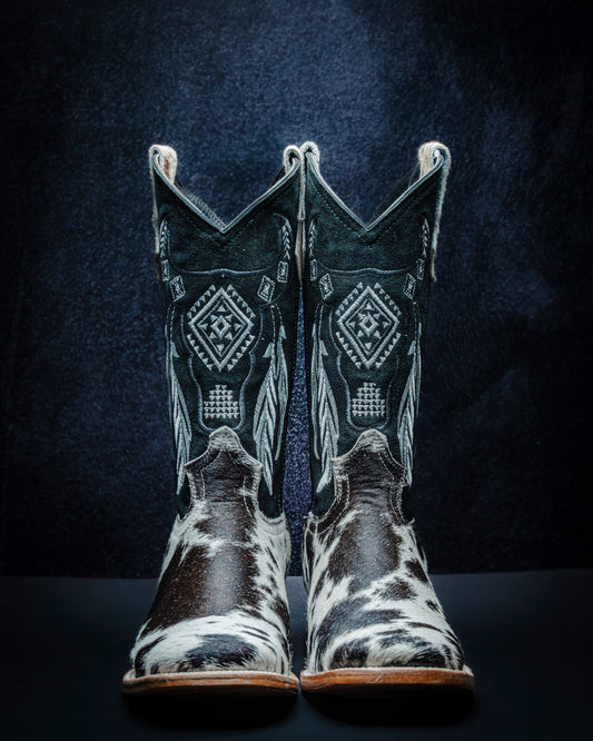 Original leather boot for women made from black and white hair-on-hide, short shaft.