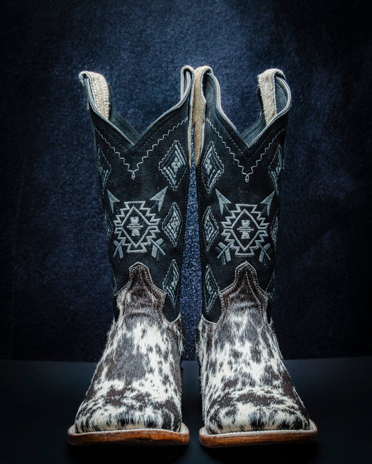 Original leather boot for men made from black and white hair-on-hide.