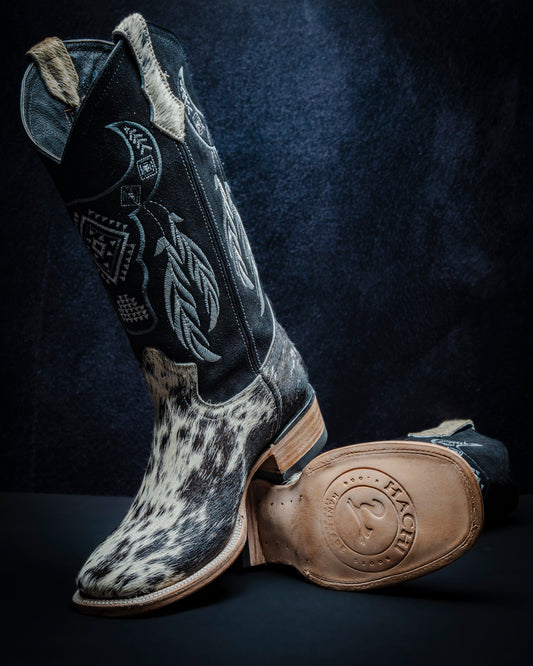 Original leather boot for women with black and white hair-on-hide and tall shaft.