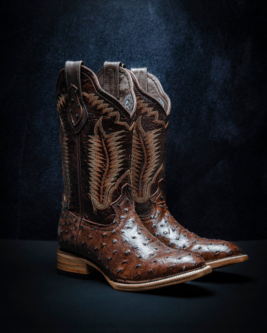 Ostrich-style plastisol leather boot for men, brown color.